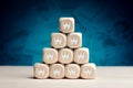 South Korean Won symbol on wooden cubes against money background. Financial reserves, growth, profit, investment or savings in Royalty Free Stock Photo