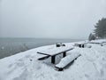 South Lake Tahoe, California, USA - March 2 2024: Beach in South Lake Tahoe covered in snow from blizzard. Royalty Free Stock Photo