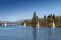 Sailboats racing at a regatta event on Lake Windermere in the Lake District National Park, North West England, UK