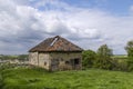 Old barn built from mixed building materials that were available locally such as marl.