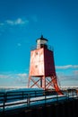 Prime look at bold red South Pier Lighthouse in Charlevoix Michigan