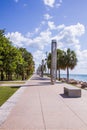 South Point Park in Miami Beach skyline buildings ocean view people at a distance social distancing on a sunny day walking Royalty Free Stock Photo