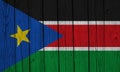 South Sudan Flag Over Wood Planks