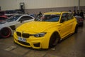 Modified yellow BMW 320i F30 in The Elite showcase