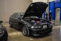 Modified Black BMW 530i in The Elite showcase Royalty Free Stock Photo