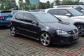 Black Volkswagen Golf GTI MK5 on parking lot