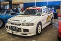 White Mitsubishi Lancer evolution III race car