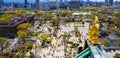 South view from Osaka Castle as seen from the roof that is decorating by the golden fish, with scenery of Osaka skyscrapers in Royalty Free Stock Photo