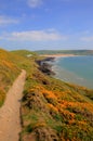 South west coast path to Croyde from Woolacombe Devon England UK in summer with blue sky Royalty Free Stock Photo