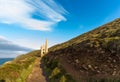 South west coast path and Towanroath shaft Engine House. Royalty Free Stock Photo