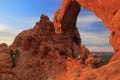 South Window Arch glowing at sunrise, Arches National Park, Utah, USA