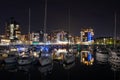 08-08-2019 Southampton, Hampshire, UK Night at Ocean village marina in Southampton with lights reflecting in the water Royalty Free Stock Photo