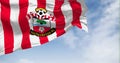 Southampton Football Club flag waving in the wind on a clear day