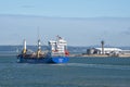 Cargo ship with deck cargo of luxury boats. Royalty Free Stock Photo