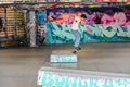 Young British skateboarder skating at London Southbank Skate Space