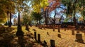 SOUTHBRIDGE, MASSACHUSETS. USA - NOVEMBER 17 2017. Old graveyard in a small town in New England with stone tombs autumn leaves fal Royalty Free Stock Photo