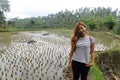 Southeast asian woman with traditional rice plantation