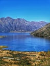 The Southern Alps and Lake Hawea on the South Island of New Zraland on a sunny autumn day