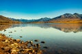 Southern Alps reflected in calm still water on Lake Clearwater, Ashburton Lakes high country Royalty Free Stock Photo