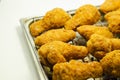 Southern crispy battered fried chicken wings, deep-fried chicken wings on the metal tray Royalty Free Stock Photo