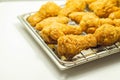 Southern crispy battered fried chicken wings, deep-fried chicken wings on the metal tray Royalty Free Stock Photo