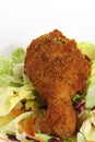 Southern fried chicken on salad plate