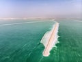 The southern part of the Dead Sea, is divided into pools from which extract minerals. The rocky shore is covered with white salt