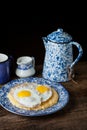 Southern style grits served with two sunny side fried eggs