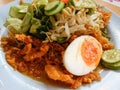 Southern of Thailand salad included of boiled egg, fried prawn, rice vermicelli, cucumber, morning glory, bean sprouts and sauce Royalty Free Stock Photo