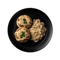 Southernstyle Biscuits And Gravy On Black Smooth Round Plate On Isolated Transparent Background U.S. Dish. Generative AI Royalty Free Stock Photo