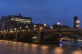 Southwark bridge and buildings at dusk in London England