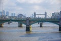 Southwark Bridge over the River Thames in London, England Royalty Free Stock Photo