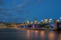 Southwark Bridge from the south bank of the River Thames in the early evening Royalty Free Stock Photo