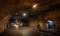 Southwark, London, UK: Bermondsey Street passing through a road tunnel with cyclist and pedestrians