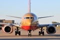 A Southwest Airlines airplane pulling into the gat Royalty Free Stock Photo