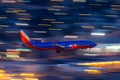 Southwest Airlines Boeing 737 airliner on approach to land at McCarran International Airport in Las Vegas at night