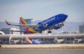 Southwest Airlines passanger jet taking off at John Wayne Airport Royalty Free Stock Photo