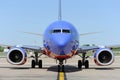 A Southwest Airlines pullint into the gate Royalty Free Stock Photo