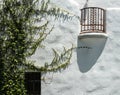 Stucco wall, vines and balcony Royalty Free Stock Photo