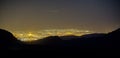 Southwest Landscape Red Rock Hills Downtown Las Vegas at night Royalty Free Stock Photo