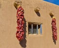 Southwestern Adobe Dwelling and Chilies