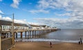 Southwold`s iconic pier against a dramatic sky in Southwold, Suffolk, UK