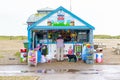 One male customer shopping at harbour kiosk in Southwold, UK