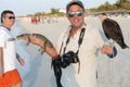 Photographer with a aligator and a bird at Varadero Beach