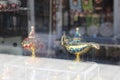 Souvenir Aladin oil lamp, golden Genie lamp in the window market in Old Town Sarajevo. Royalty Free Stock Photo