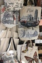 Souvenir bags of the leaning tower of Pisa. Market stalls in the