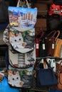 Souvenir bags of the leaning tower of Pisa. Market stalls in the