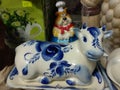 Souvenir ceramic cow butter dish on the shelf