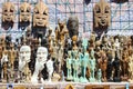 Souvenir display showing statues and masks in Aswan