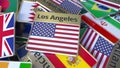 Souvenir magnet or badge with Los Angeles text and national flag among different ones. Traveling to the United States